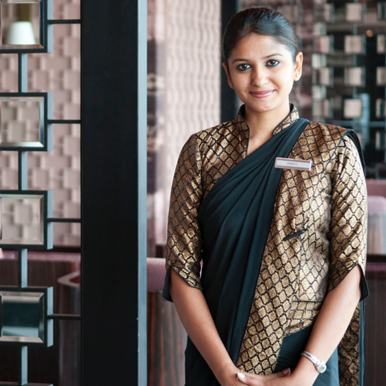 Smiling woman at front desk