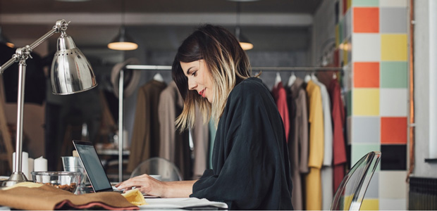 woman on laptop at her desk