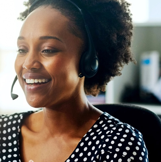 lady smiling with headset on