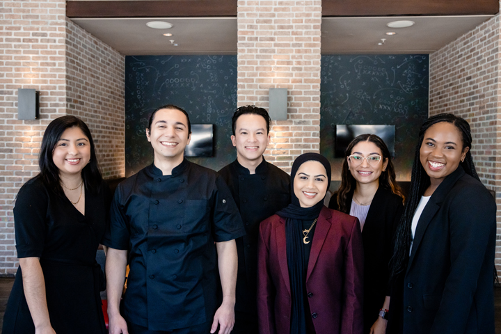 group of interns smiling